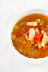 vegetable soup in white bowl