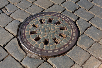 manhole on pavement