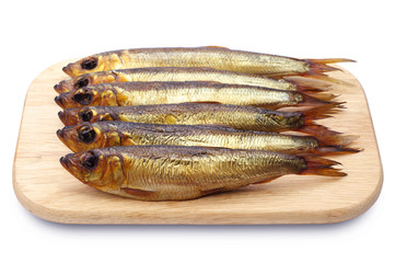 Smoked herring on a cutting board