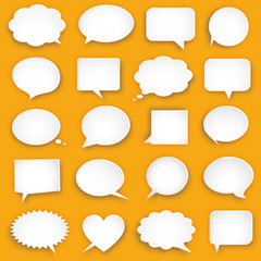 white paper bubbles for speech on orange background