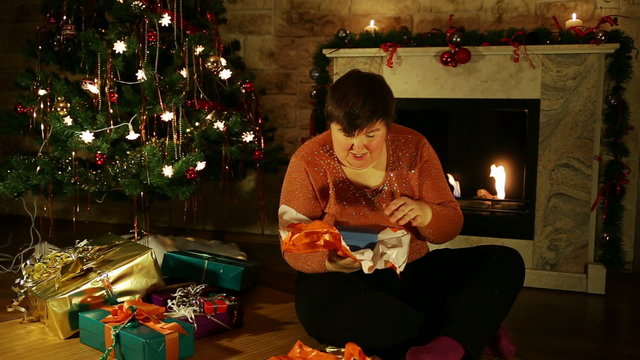 disabled woman is pleased about gifts