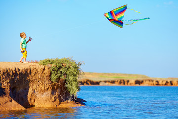 cute kid playing with kite