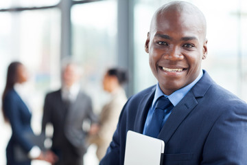 young african corporate worker in modern office