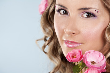 beautiful face with pink roses