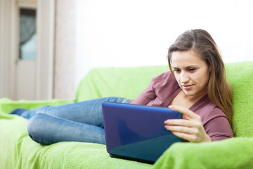 smiling woman using laptop