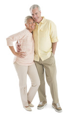 Loving Senior Couple Against White Background