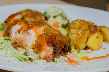 Chicken roll with potato and salad