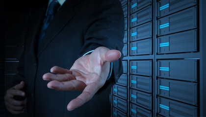 businessman open hand and server room background