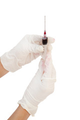 syringe with blood in hand on white background