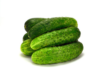 bunch of cucumbers on a white background