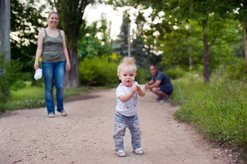 Fototapeta premium Family walking in a park