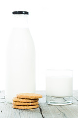 Bottle of fresh milk with cookies