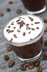 chocolate and coffee mousse with whipped cream, close-up
