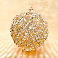golden Christmas ball and bokeh