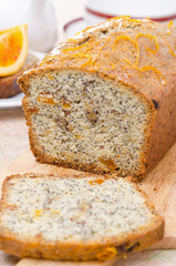 orange cake with poppy seeds, dried apricots, walnuts and honey