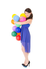 Fototapeta na wymiar Young girl with balloons on a white background