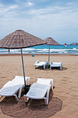 Beach umbrellas and sunbeds