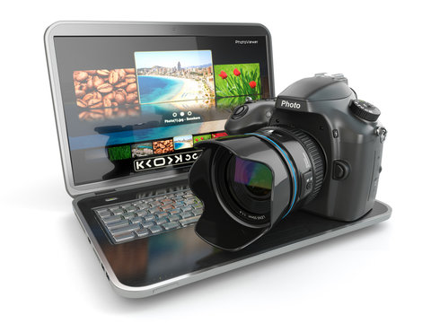 Digital photo camera and laptop. Journalist  or  traveler equipm