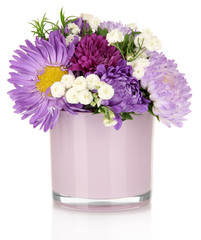 Naklejka na ściany i meble Beautiful bouquet of bright flowers in glass vase, isolated
