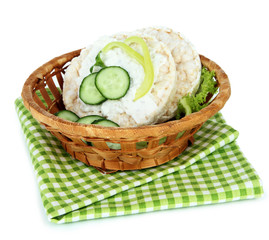 Tasty crispbreads with vegetables, isolated on white