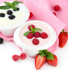 Delicious yogurt with berries isolated on white