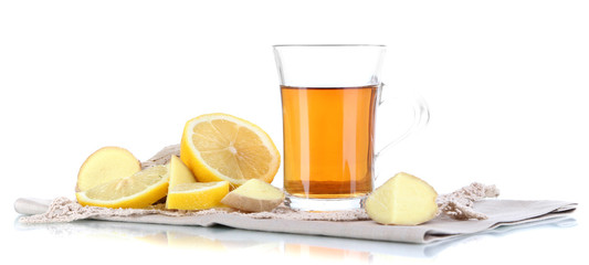 Cup of tea with ginger on napkin isolated on white