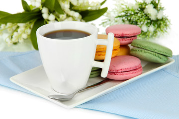 Coffee and macaroons close-up