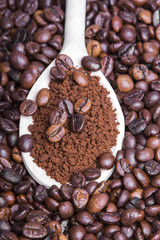 instant coffee on coffee beans background