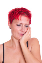 junge Frau mit Zahnschmerzen