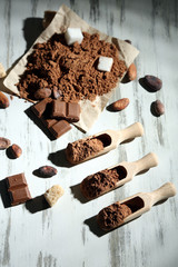 Cocoa powder on wooden table