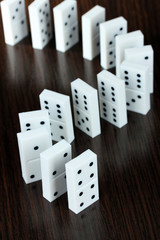 Dominoes on wooden background