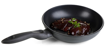Raw liver in pan isolated on white