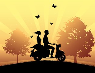 Girl and boy riding a scooter at the park