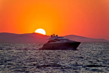 Yacht on sea with epic sunset