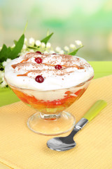 Tasty jelly in bowl on table on light background
