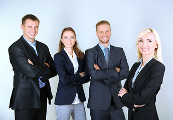 Group of business people on gray background