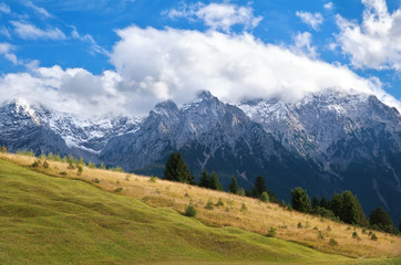 Fototapeta na wymiar clouds on mountain peaks, Bavaria