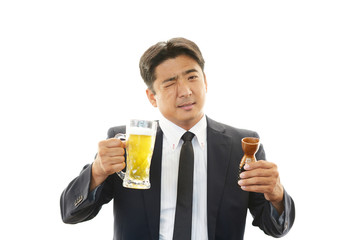 飲みすぎたビジネスマン