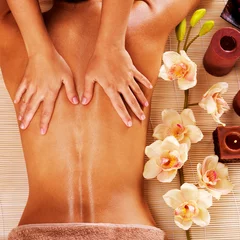 Papier Peint photo Salon de massage Masseur doing massage on woman back in spa salon
