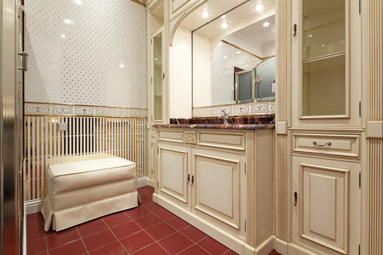 Interior of designer bathroom in classic style