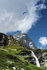 Tuinposter Paragliding over the Matterhorn, Aosta Valley © Massimo De Candido