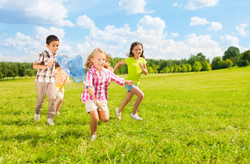 Kids chasing butterfly