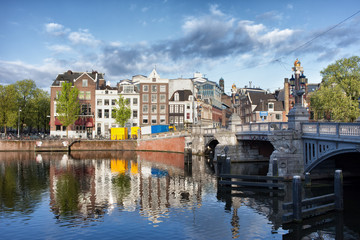 Fototapeta na wymiar City of Amsterdam by the Amstel River