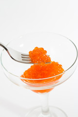 Salmon roe in goblet with lemon and parsley