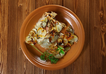 baked .perch   with potatoe