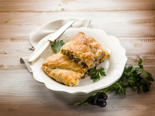 strudel stuffed with tuna and black olives