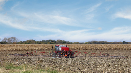 Fototapeta premium Spraying Farm Field