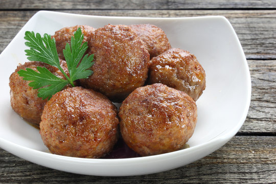 Fried pork meatballs in bowl