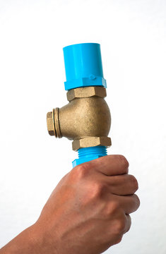 Bronze Swing Check Valve And Pvc Pipe Connection On Hand.