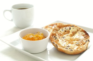 toasted tea cake with marmalade and coffee cup